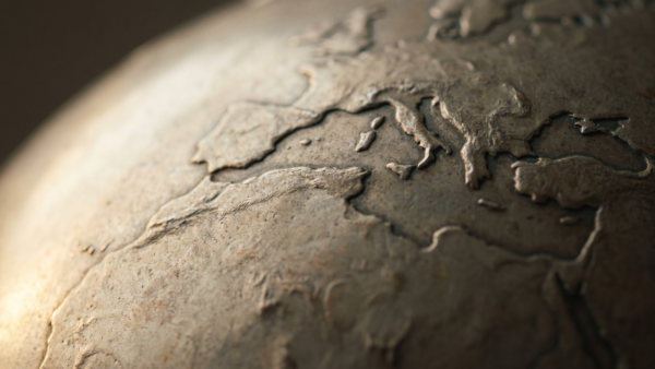 emerging markets etf bild 1 Nahaufnahme eines Metallglobus mit geprÀgten Kontinentumrissen