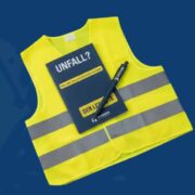 Warnweste, ein Kugelschreiber sowie ein EU-Unfallbericht Gratis